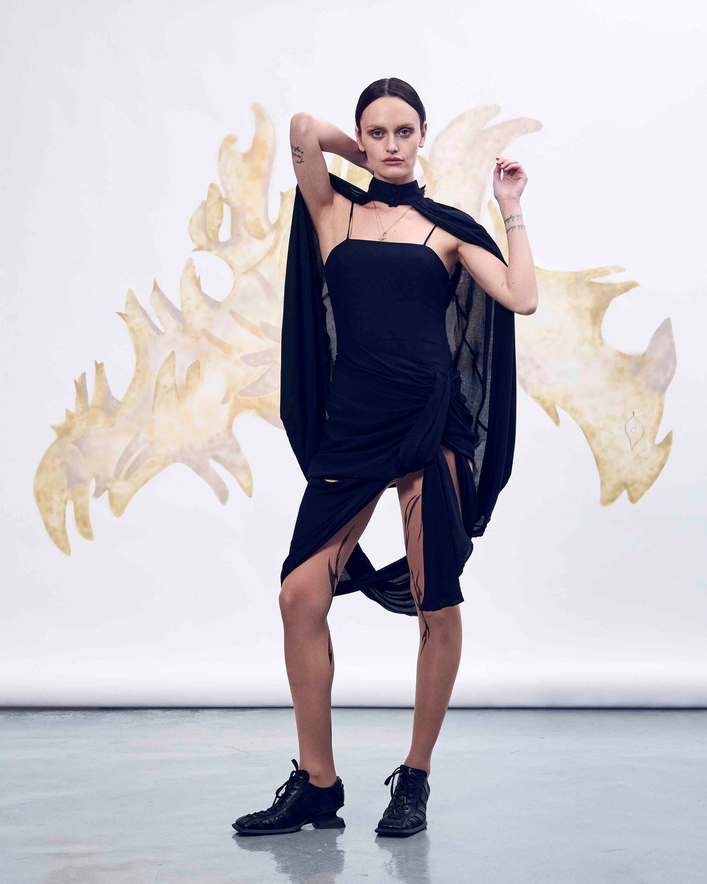 Black deconstructed cape dress