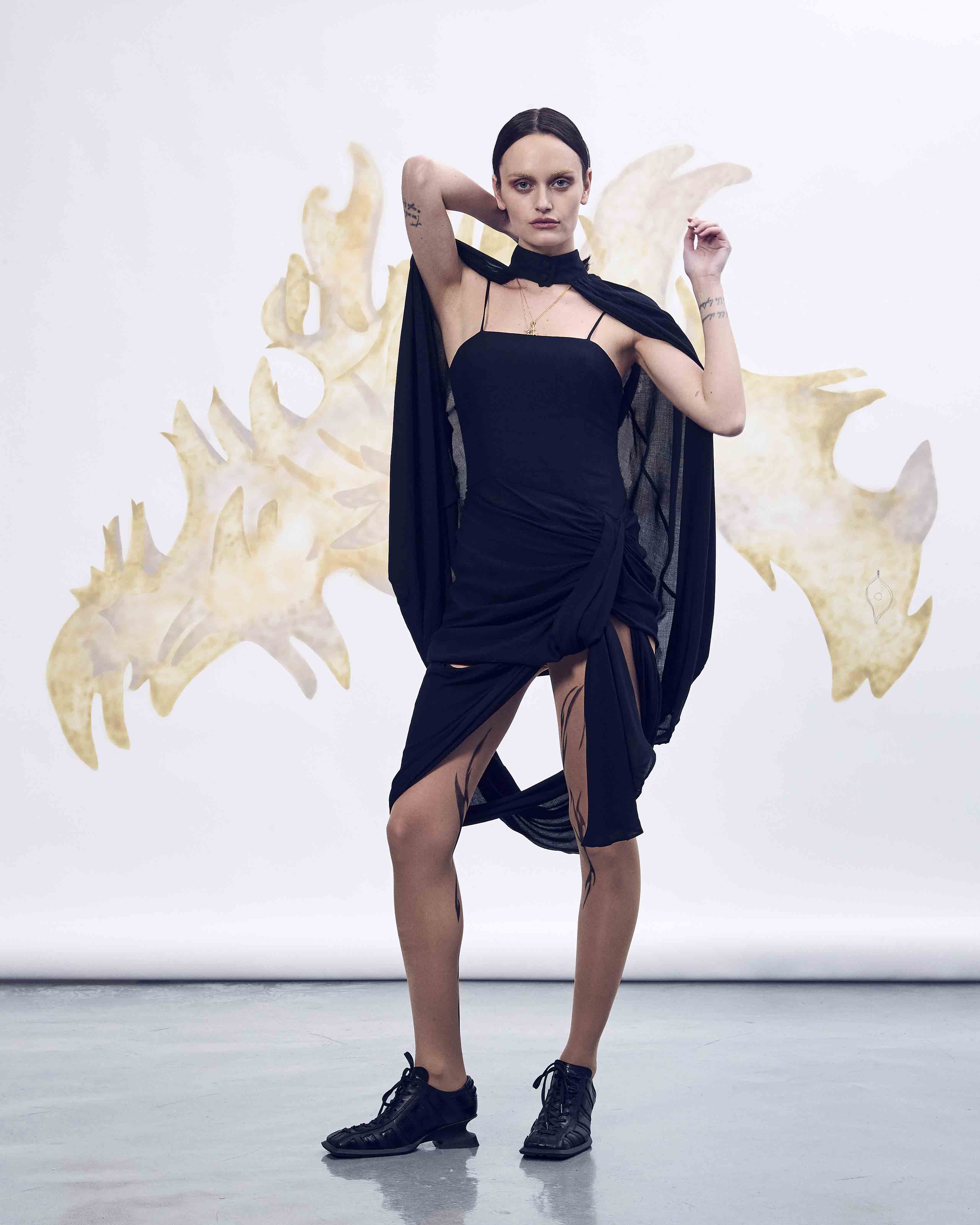 Black deconstructed cape dress