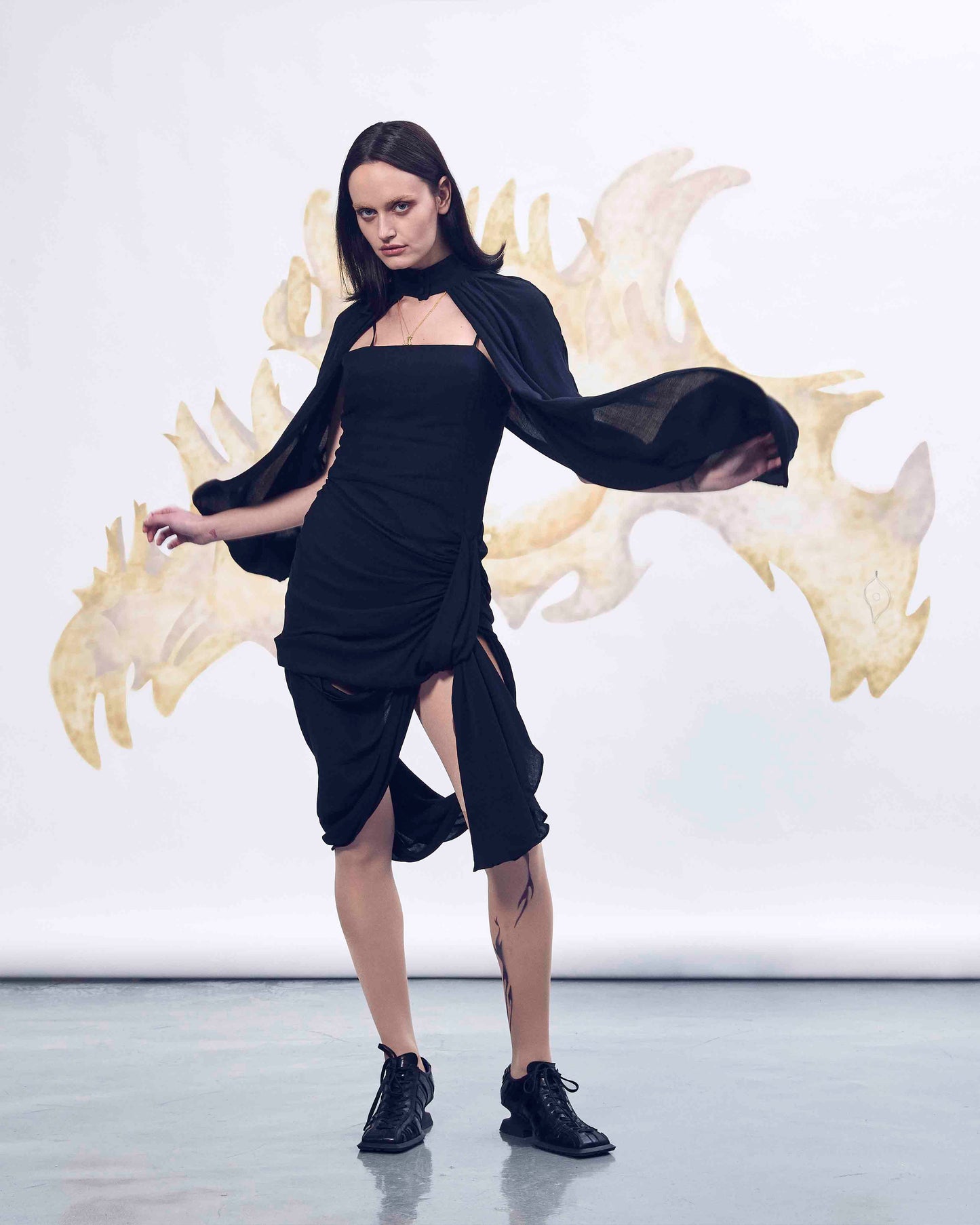 Black deconstructed cape dress