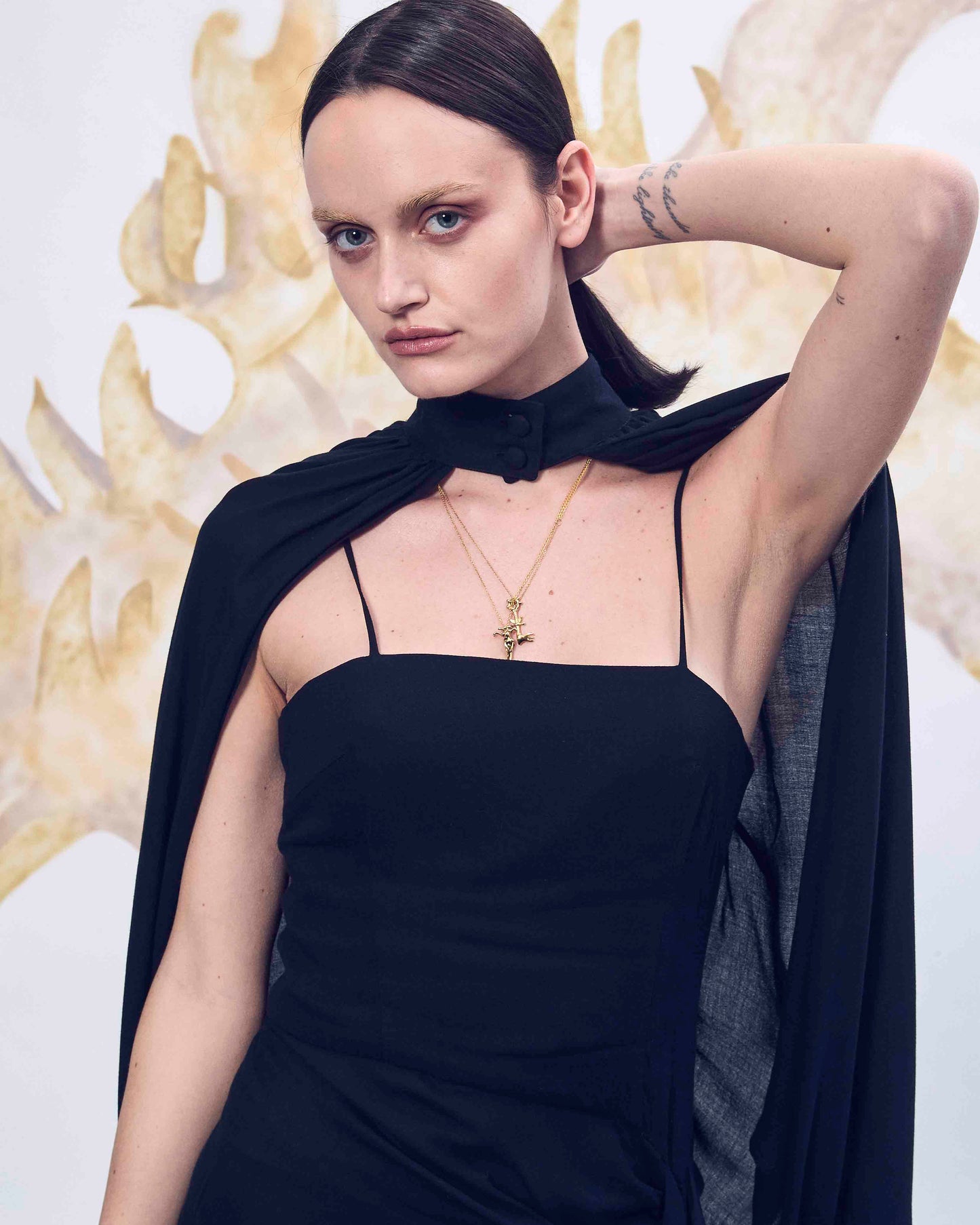 Black deconstructed cape dress